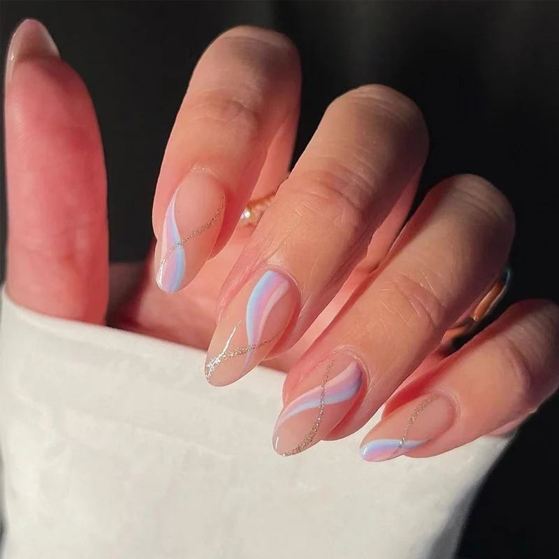 Artistic gel nails with modern gradients and rhinestone accents Stornfield