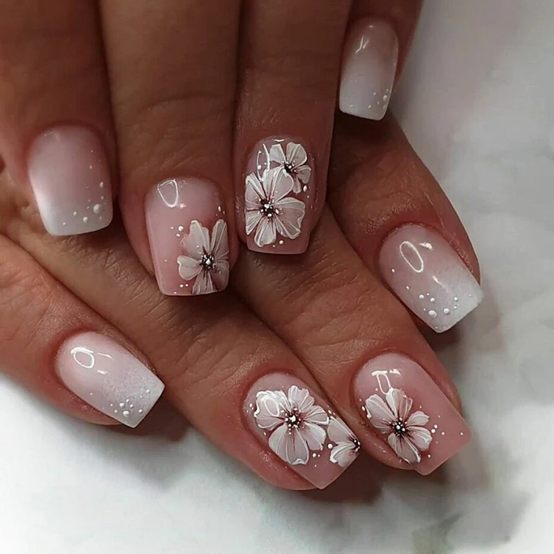 Artistic gel nails with floral decorations Stornfield