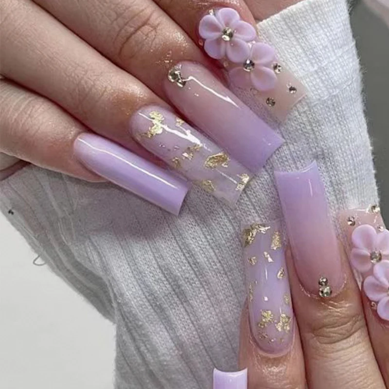 Artistic Gel Nails with Floral Design and Glitter Accents Stornfield