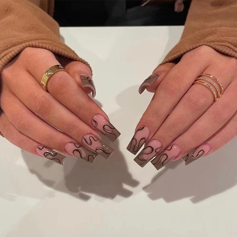 Artful Gel Nails with Elegant Floral Design and Glitter Accents Stornfield