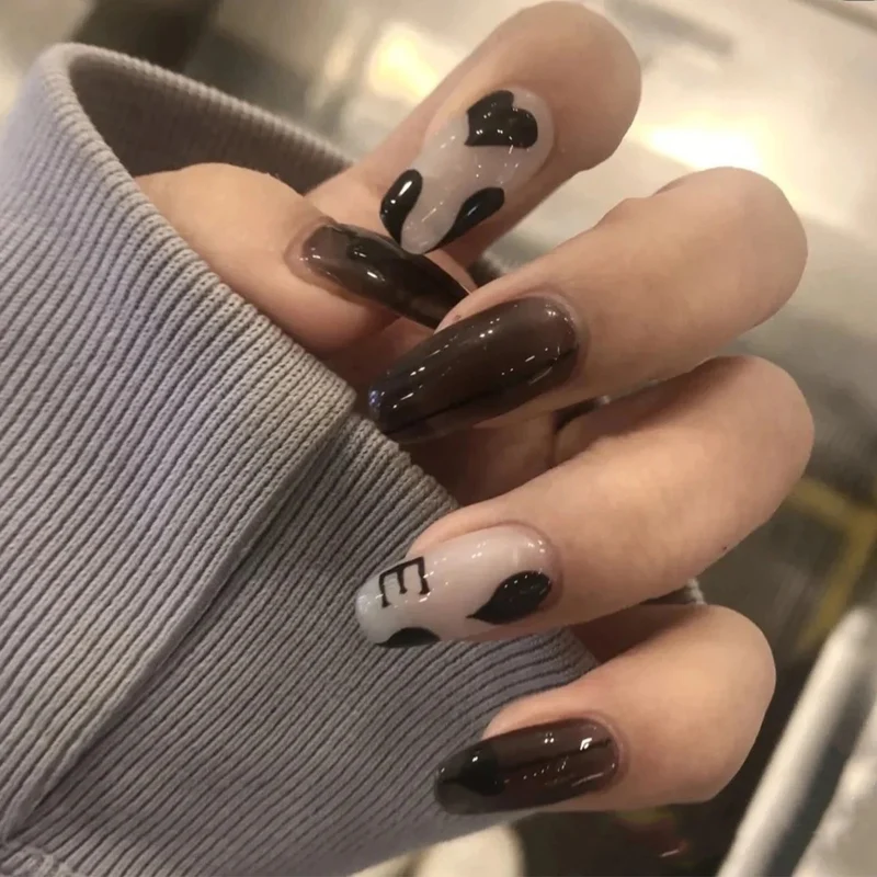 Artful Gel Nails with Elegant Floral Design and Glitter Accents Stornfield