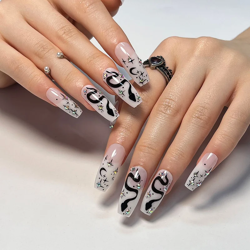 Artful gel nails with elegant 3D design and glitter accents Stornfield