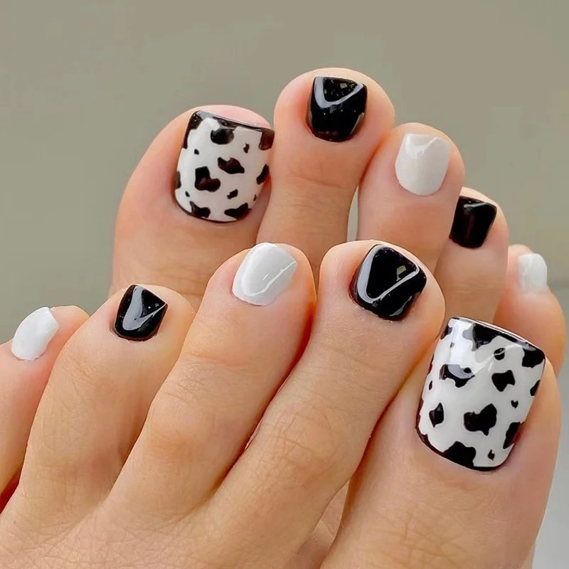 Artful toenail extensions with modern animal pattern Stornfield