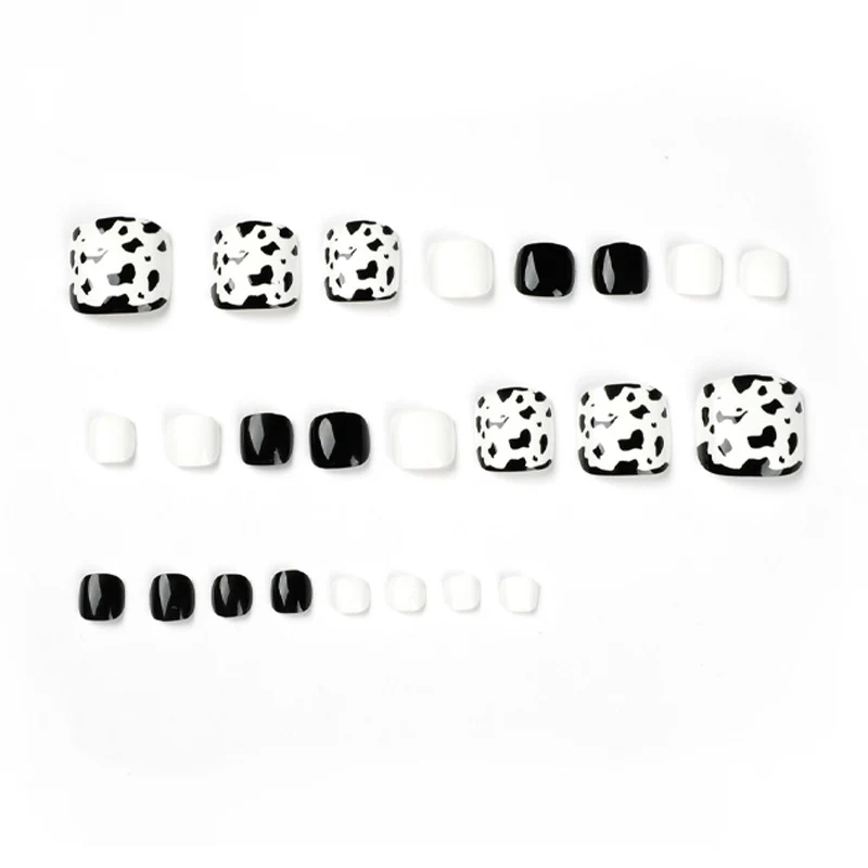 Artful toenail extensions with modern animal pattern Stornfield