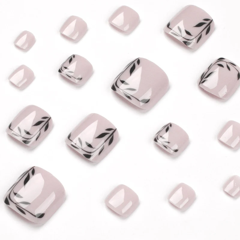Artful toenail art with delicate leaf motifs Stornfield