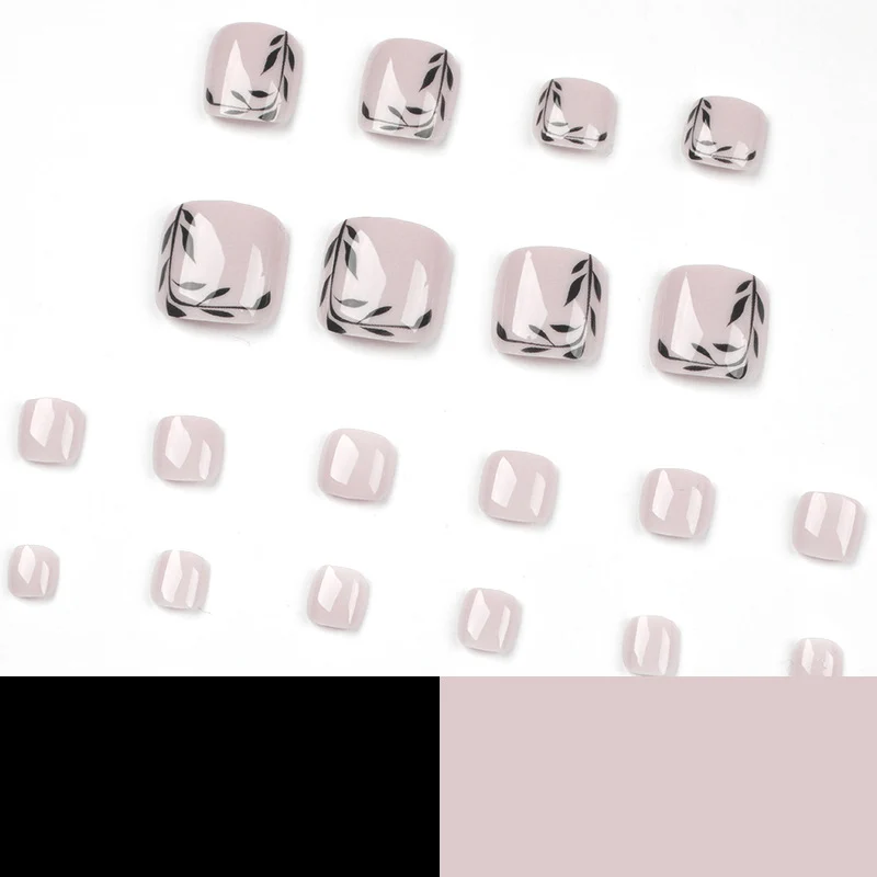 Artful toenail art with delicate leaf motifs Stornfield