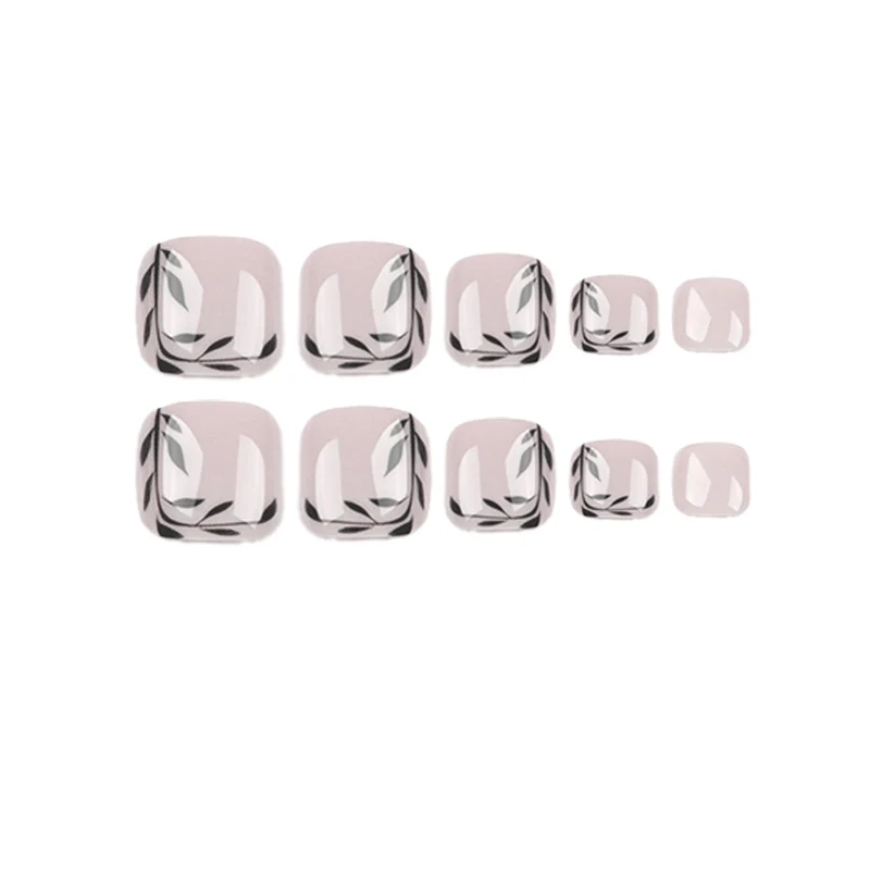 Artful toenail art with delicate leaf motifs Stornfield