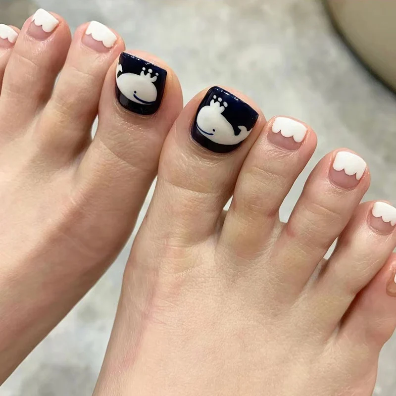Artful toenail art with a moody whale motif Stornfield
