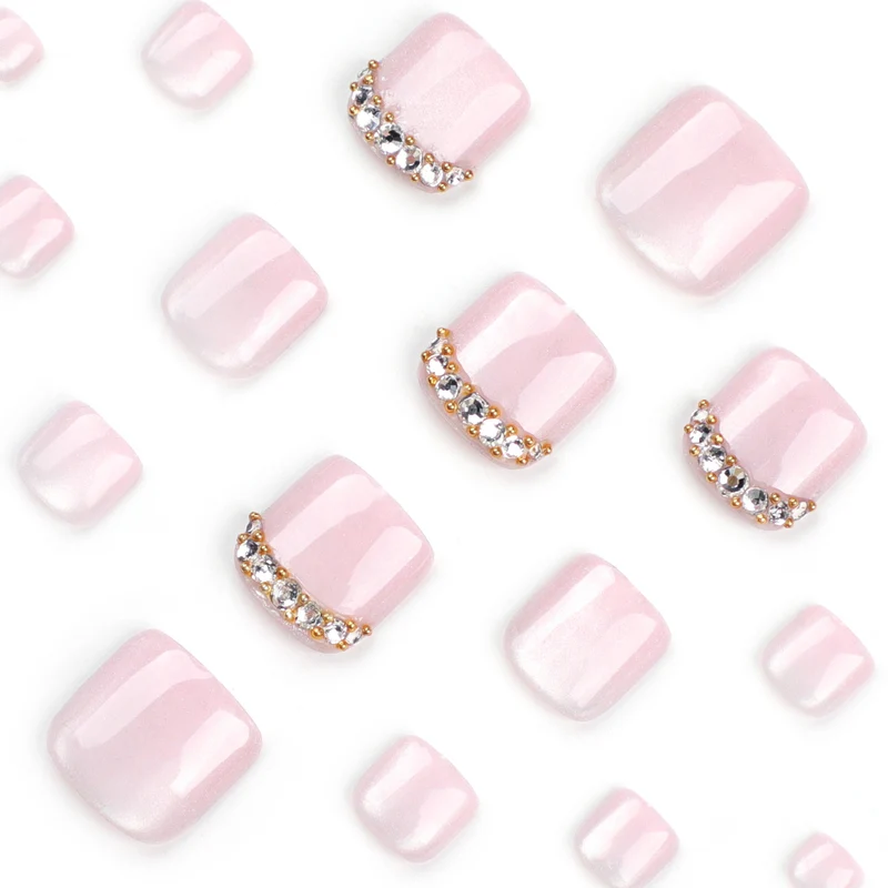 Artful toenail art with glitter and rhinestone decorations Stornfield
