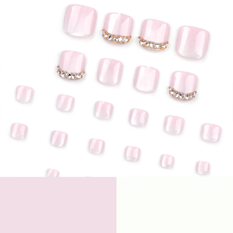 Artful toenail art with glitter and rhinestone decorations Stornfield