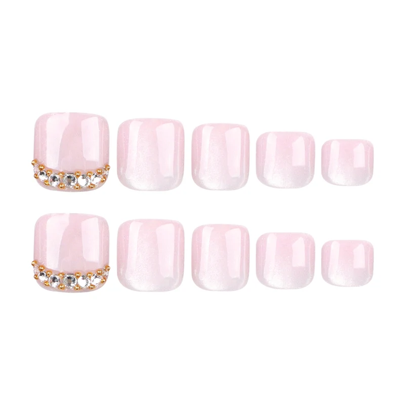Artful toenail art with glitter and rhinestone decorations Stornfield