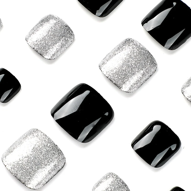 Artful toenail art with glitter and black design Stornfield
