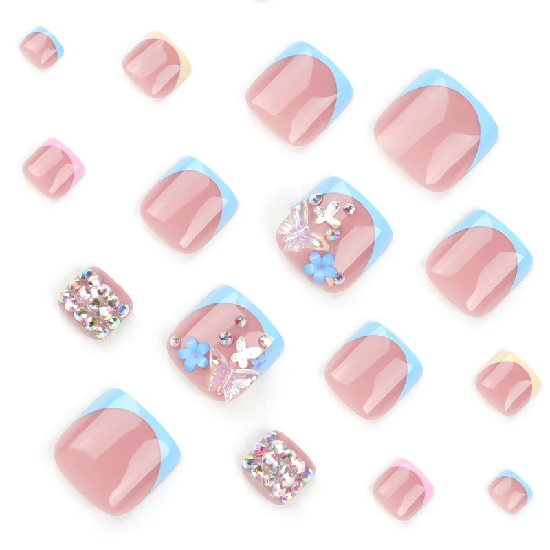 Artful toenail art with glitter and flower motifs Stornfield