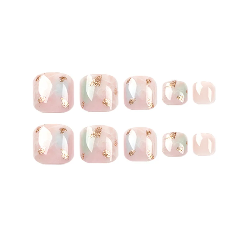 Artful toenail art with elegant marble and gold accents Stornfield