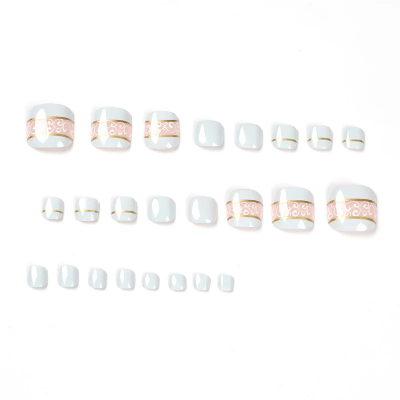 Artful toenail art with elegant golden accents Stornfield