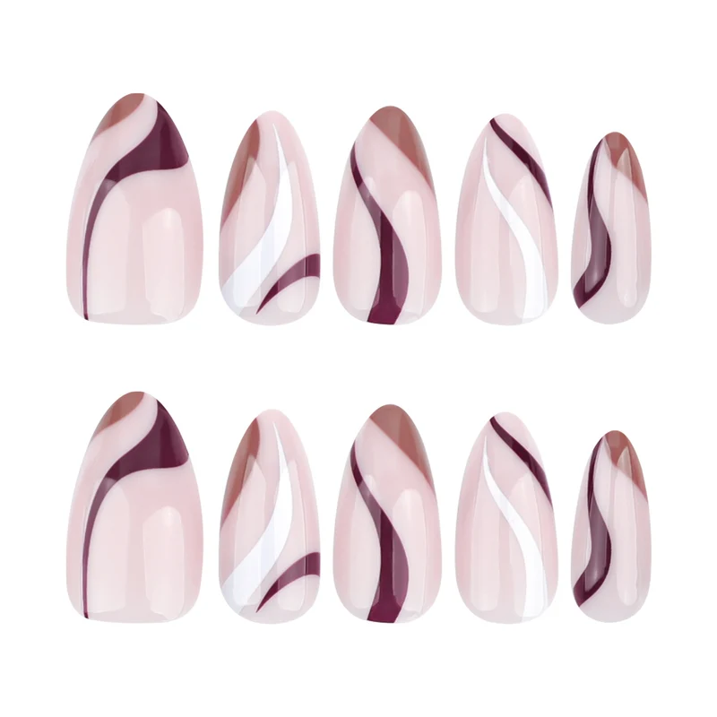 Elegante Nagelkunst mit modernem Wellenmuster und Glitzerakzenten Karnz