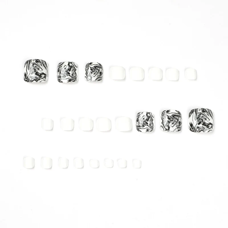 Artful toenail art in elegant marble design Stornfield