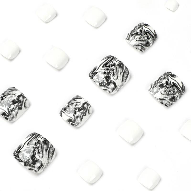 Artful toenail art in elegant marble design Stornfield