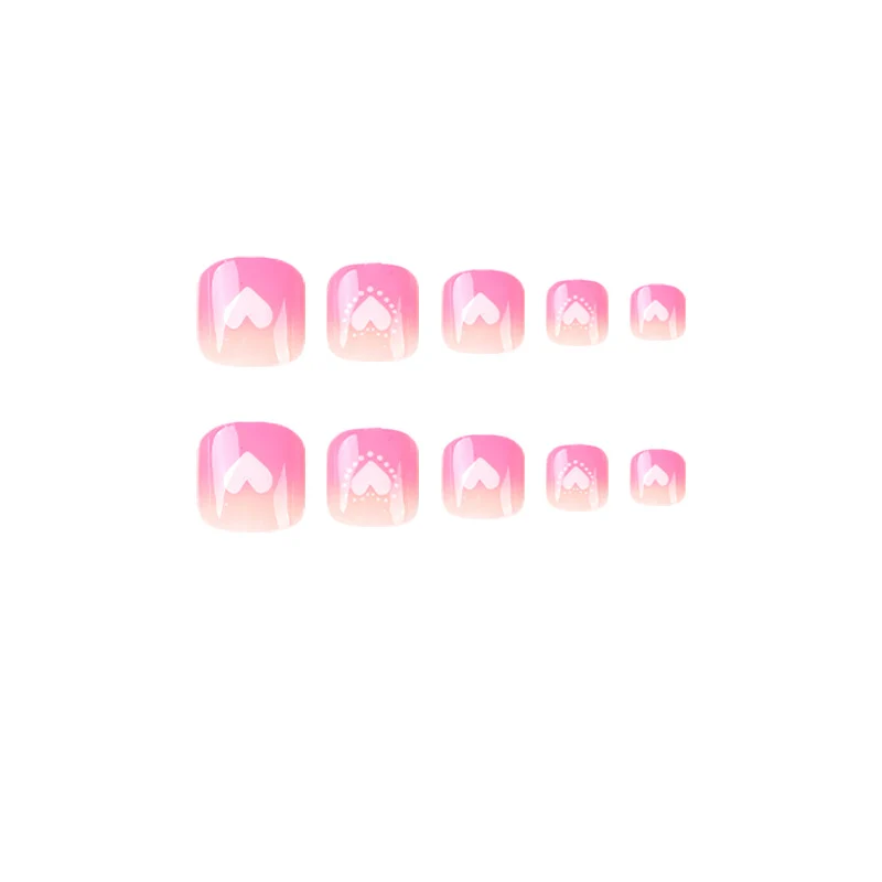 Artful toenail design with heart motifs Stornfield