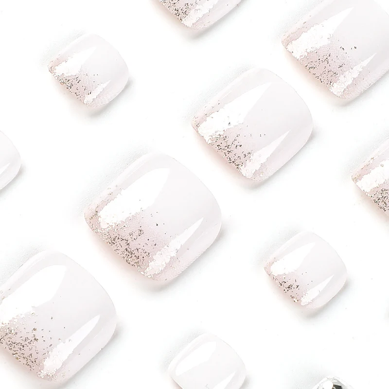 Artful toenail design with sparkling embellishments Stornfield
