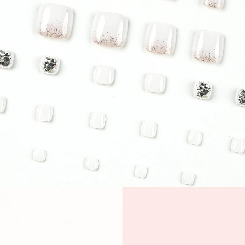 Artful toenail design with sparkling embellishments Stornfield