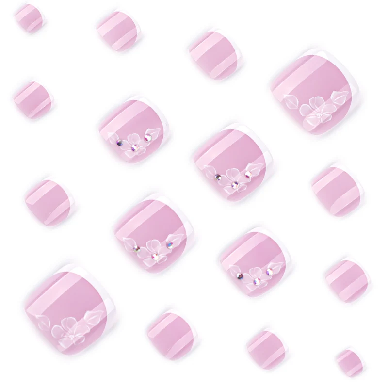 Artful toenail design with delicate flowers and glitter embellishment Stornfield