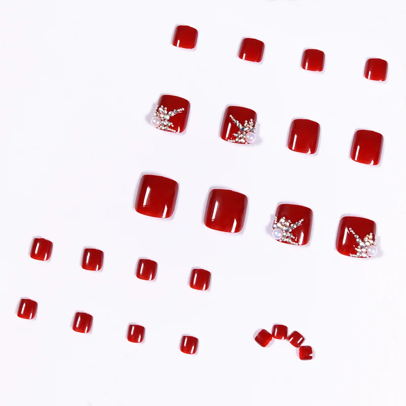 Artful toenail design with elegant rhinestone design Stornfield