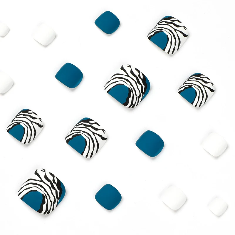 Artful toenail design in modern zebra pattern Stornfield