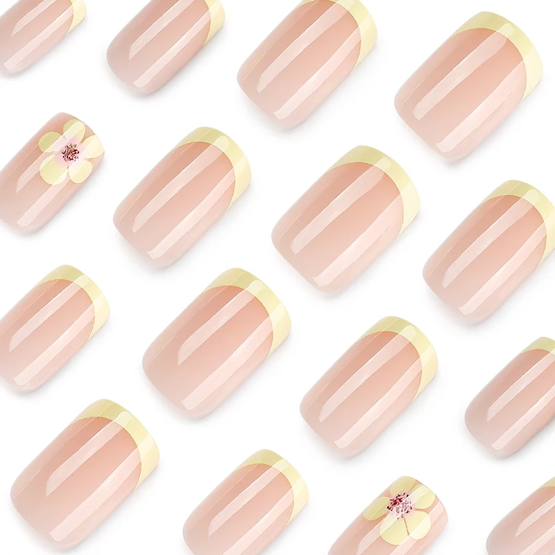 Artistic French-tip nails with floral decorations Stornfield