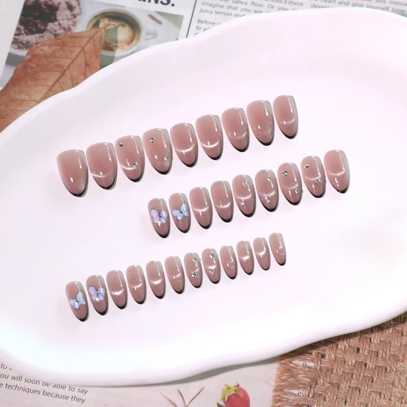 Artificial nail art with pearl and flower decorations Stornfield