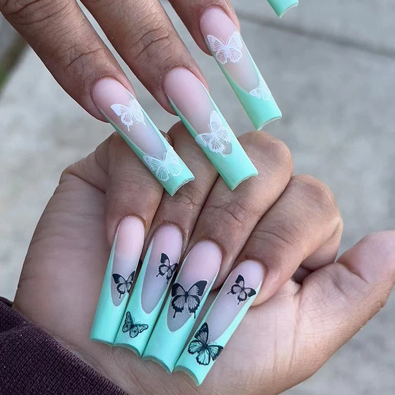 Artificial nail extensions with butterfly design Stornfield