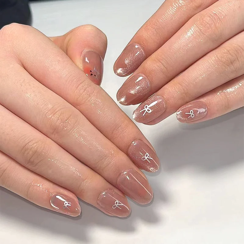 Artificial nail extensions with cute bunny design and hearts Stornfield