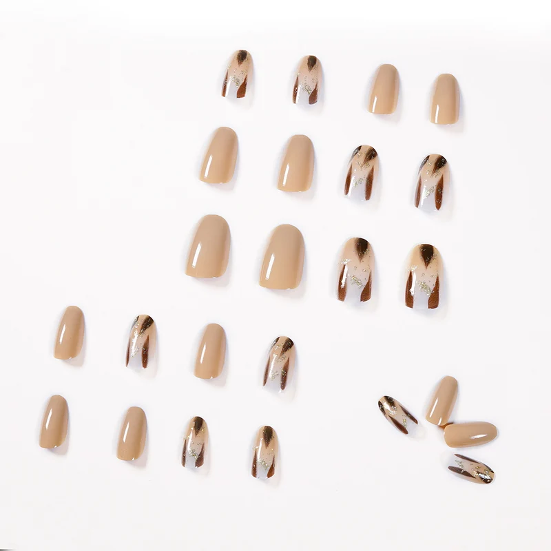 Artificial nail extensions with modern design and glitter accents Stornfield