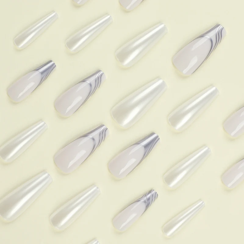 Artificial nail extensions with marbled design Stornfield