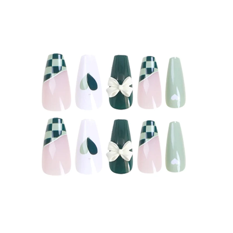 Artificial nail extensions with creative design and glitter accents Stornfield