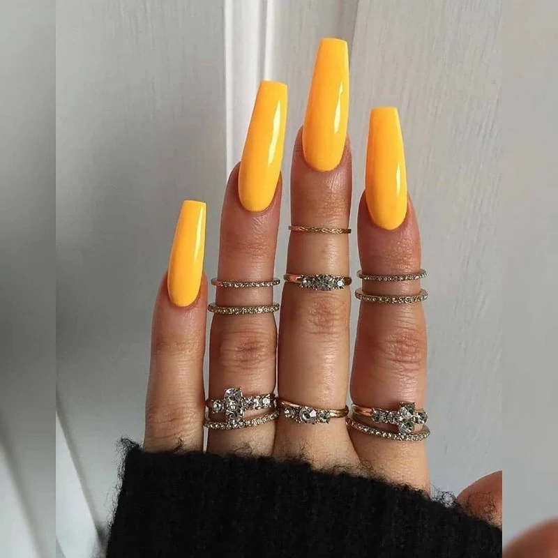 Artificial nail extensions with high gloss finish Stornfield