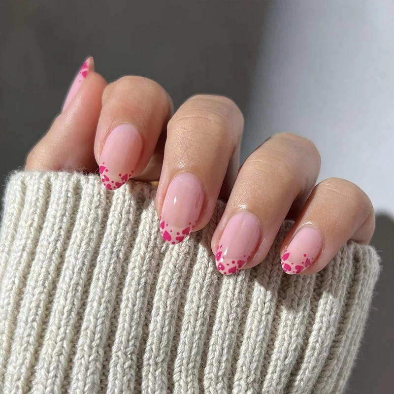 Artificial nail extensions with heart tip accents Stornfield