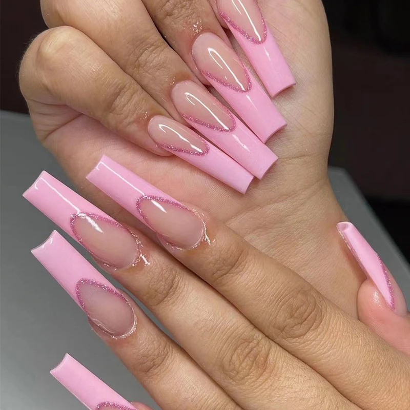 Artificial nail extensions with glitter decoration Stornfield