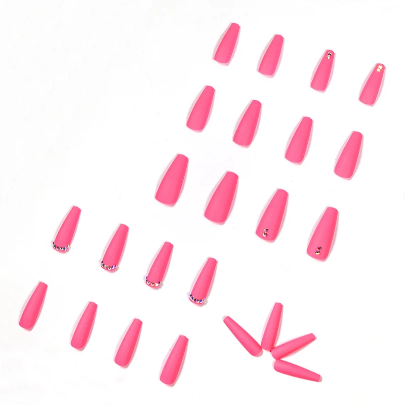 Artificial nail extensions with glitter accents Stornfield