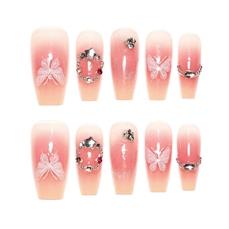 Artificial nail extensions with floral design and sparkling accents Stornfield