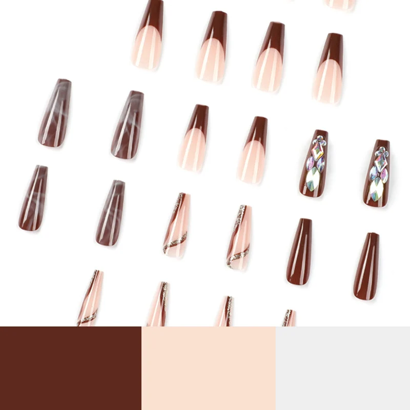 Artificial nail extensions with elegant gemstone embellishments Stornfield