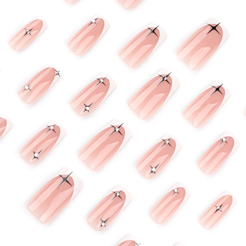 Artificial nail extensions with elegant French tip and glitter accents Stornfield