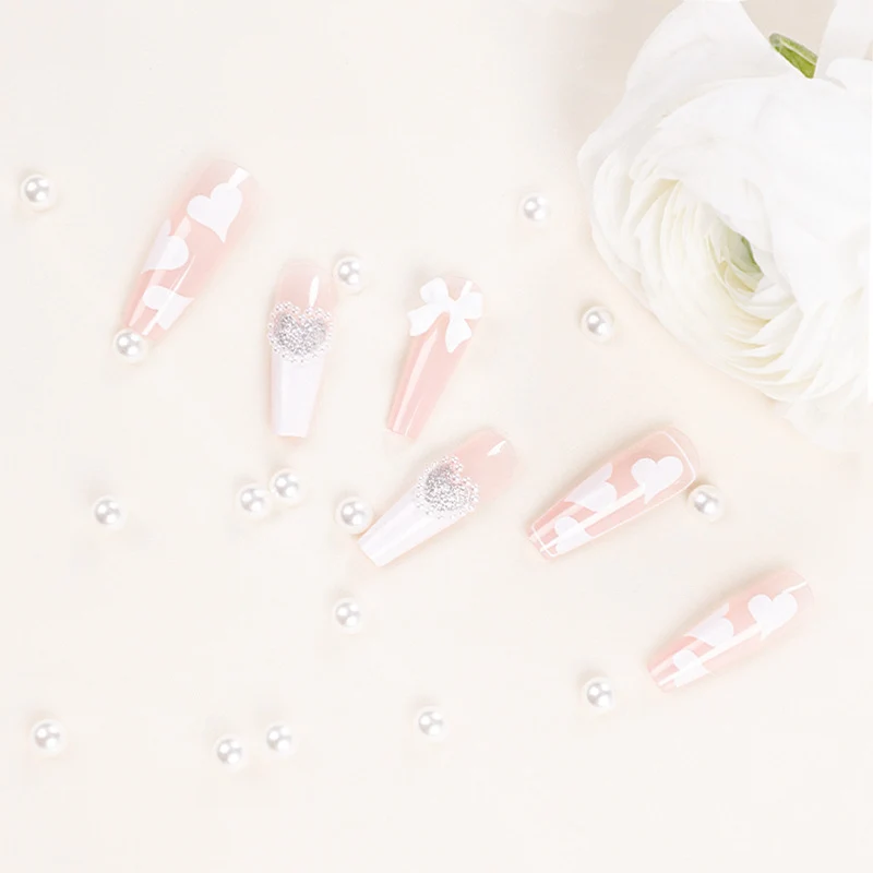 Artificial nail extensions with elegant floral design Stornfield