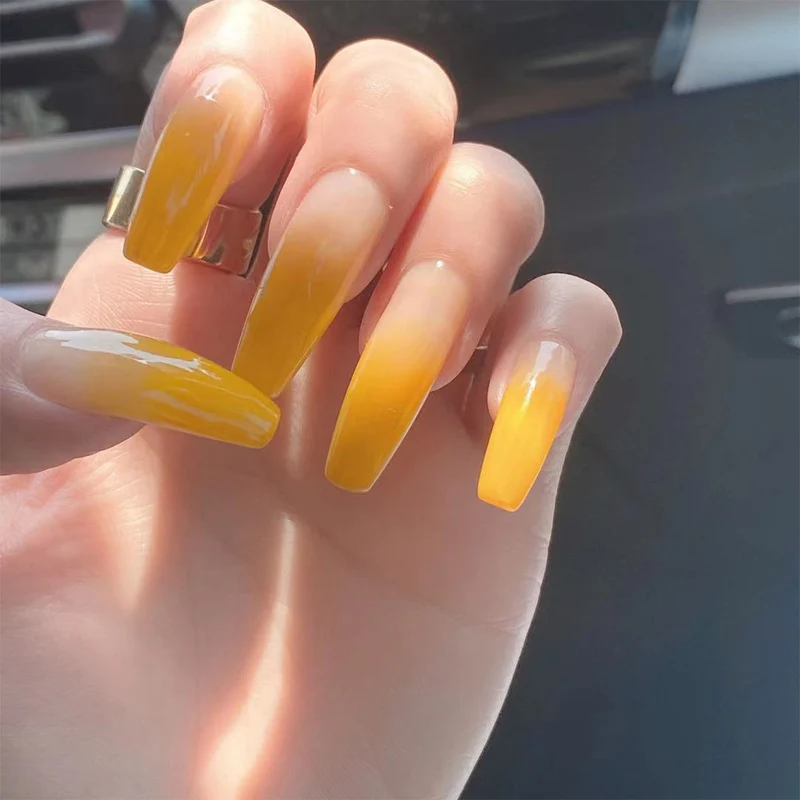 Artificial nail extensions in elegant ombre style Stornfield