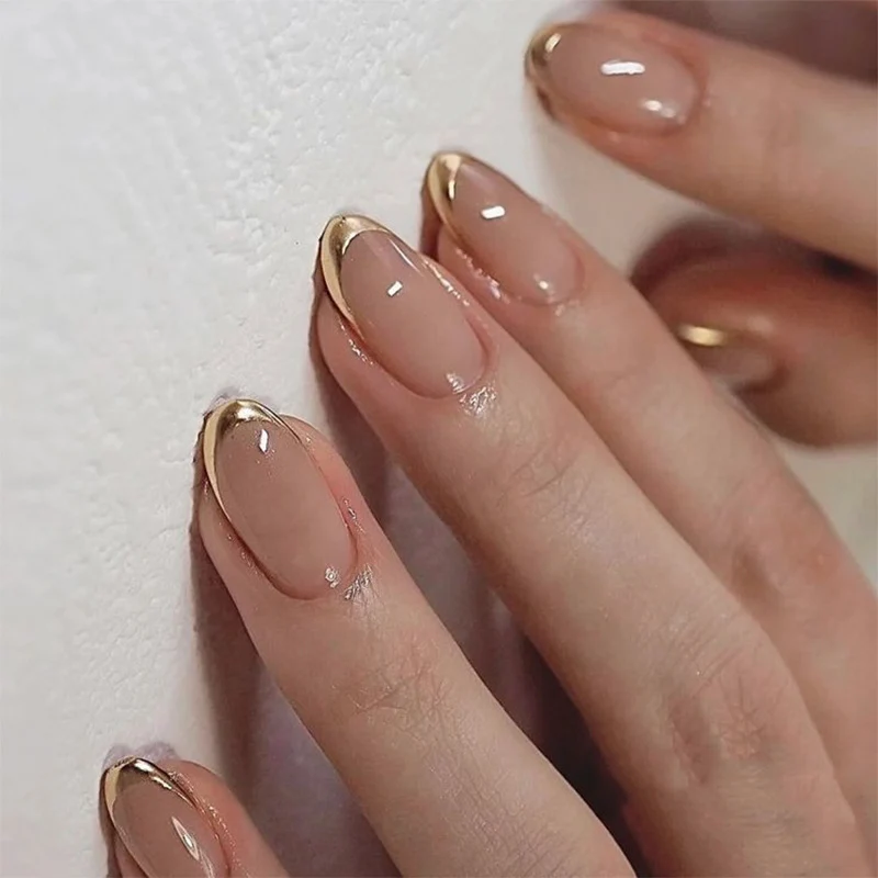 Artificial nail art with playful dots and bows Stornfield