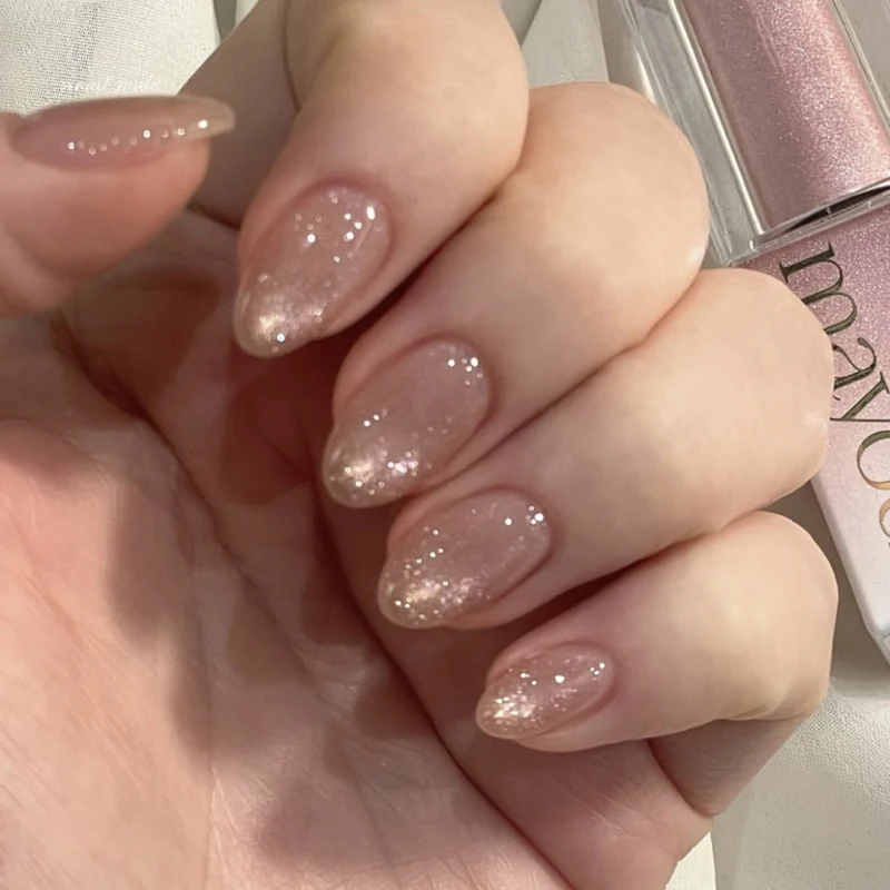 Artificial nail art with playful dots and bows Stornfield
