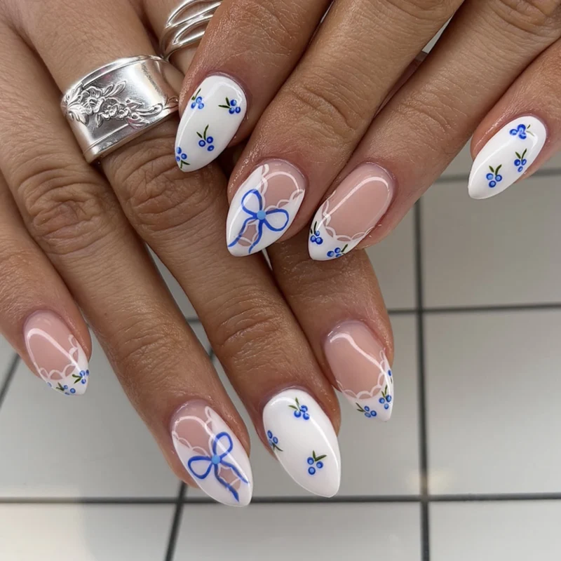 Artificial nail art with playful dots and bows Stornfield