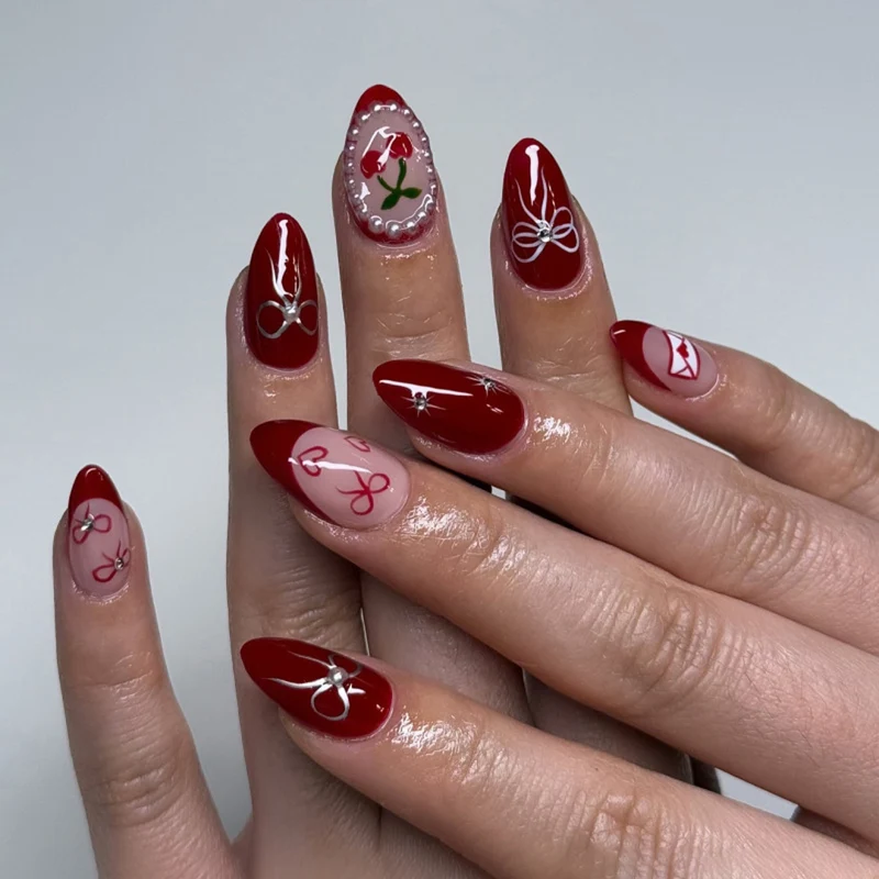 Artificial nail art with playful dots and bows Stornfield