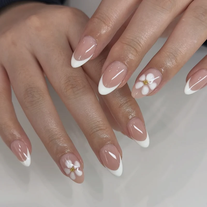 Artificial nail art with playful dots and bows Stornfield