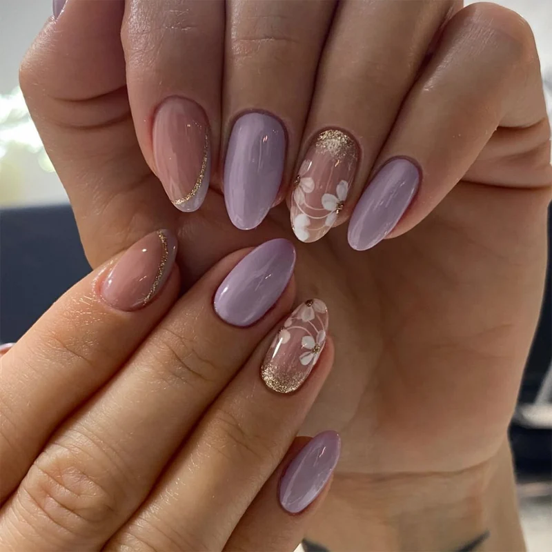 Artificial nail art with playful dots and bows Stornfield